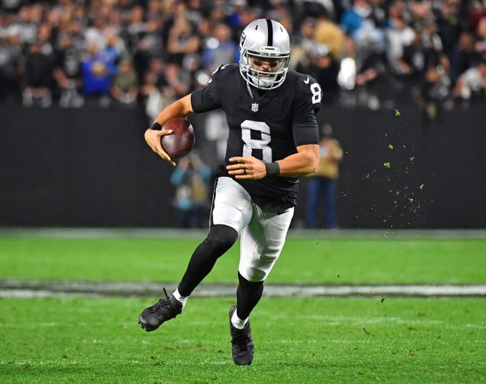 Jan 9, 2022; Paradise, Nevada, USA; Las Vegas Raiders quarterback Marcus Mariota (8) rushes with the ball during the fourth quarter against the Los Angeles Chargers at Allegiant Stadium.